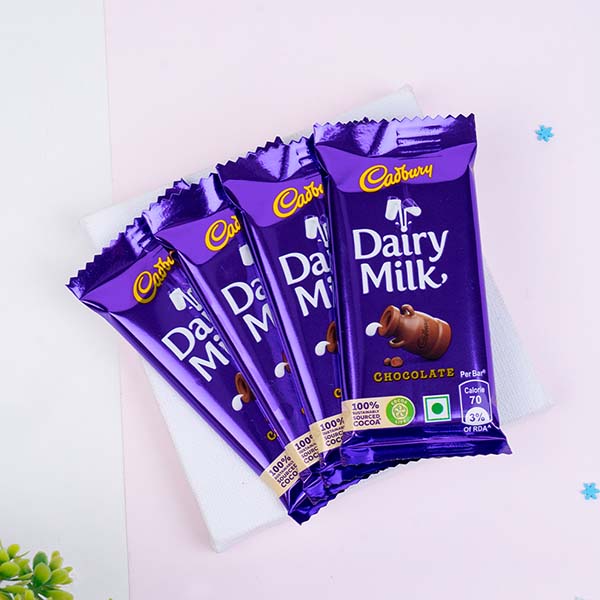 Silver Om Rakhi with Dairy Milk