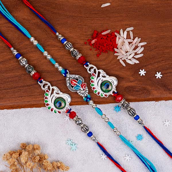 Three Designer Silver Rakhi set with Roli Chawal