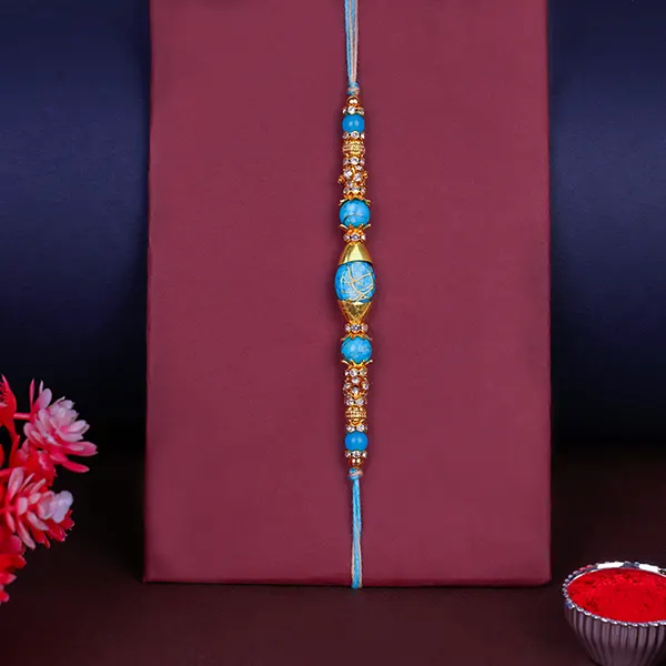 Majestic Blue Designer Rakhi with Roli and Chawal