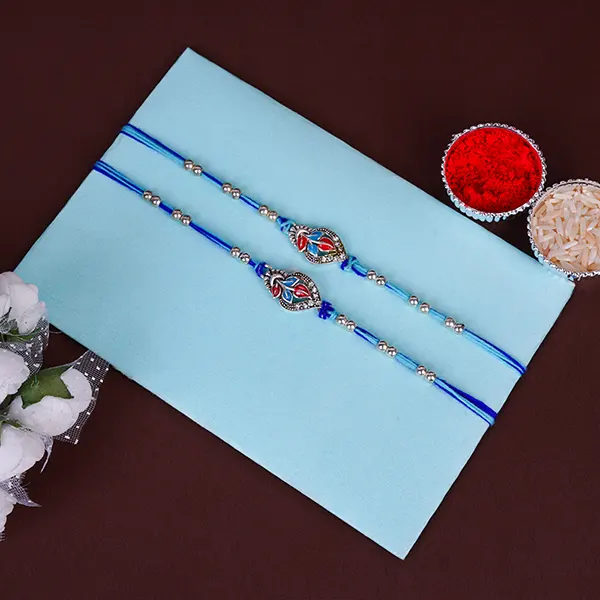 Pair of Blue Sapphire Rakhi for Brother