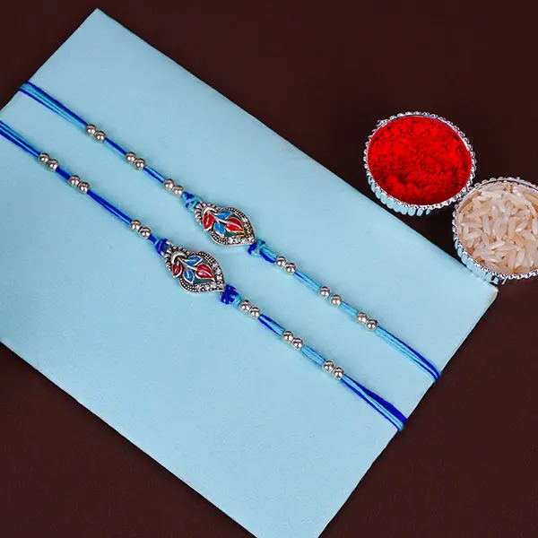 Pair of Blue Sapphire Rakhi for Brother