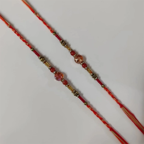 Mauli Thread Paired With Beautiful Pearls Rakhi (Pack of 2)