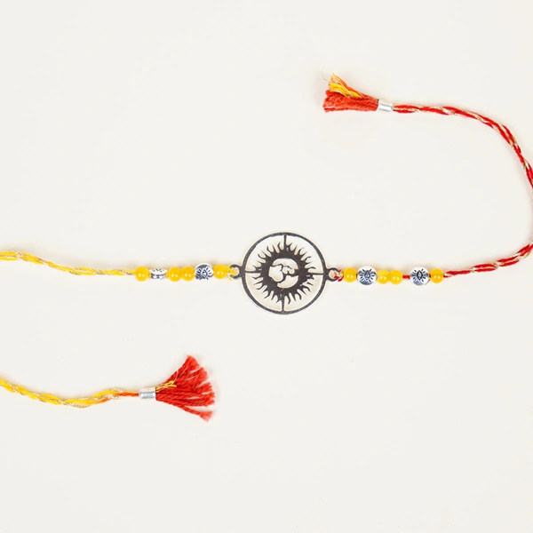 Om Silver Rakhi with Designer Pooja Thali Gift Hamper