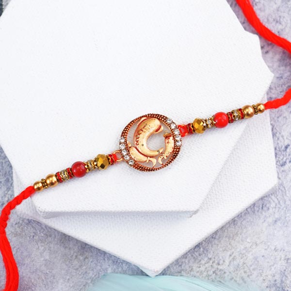 Auspicious Golden Mahadev and Ganpati Rakhi Set