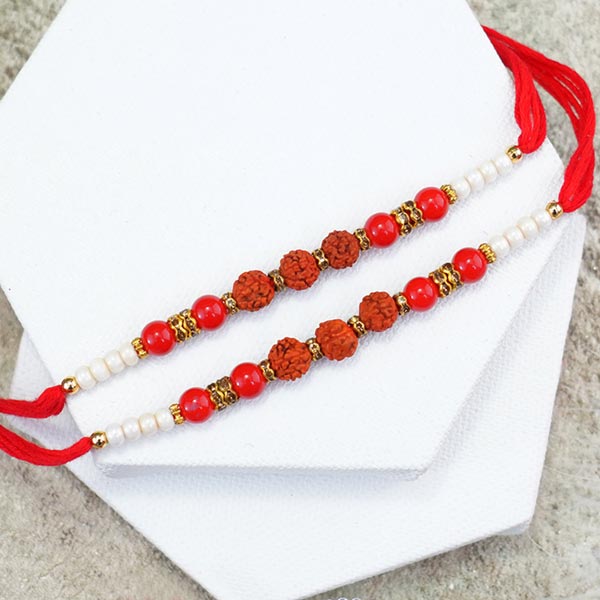Pair of Rudraksha Rakhis with Dairy Milk Silk To Hong Kong