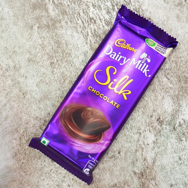 Pair of Rudraksha Rakhis with Dairy Milk Silk To Hong Kong