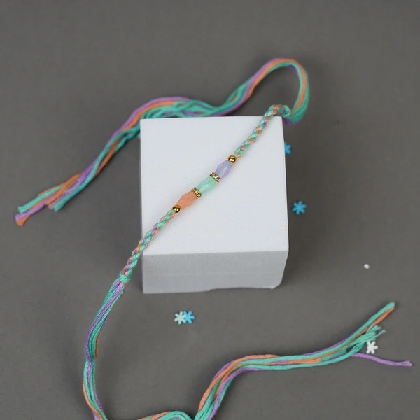 Traditional Multicolor Beaded Rakhi Gift Set with Dairy Milk Fruit & Nuts