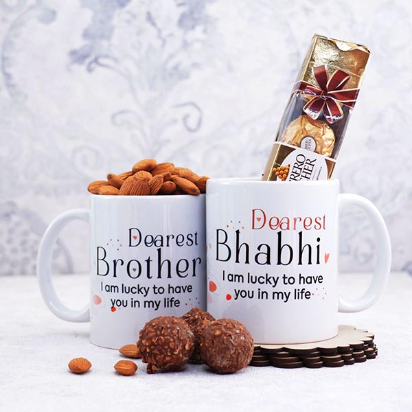 Dearest Brother Bhabhi Mugs N 2 Rakhi with Chocolates Gift Hamper Next Day Delivery