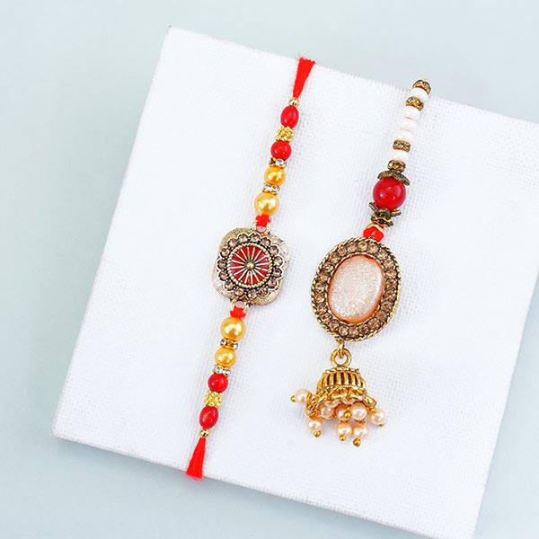 Alluring Couples Rakhi with Buddha Statue Gift Pack Next Day Delivery