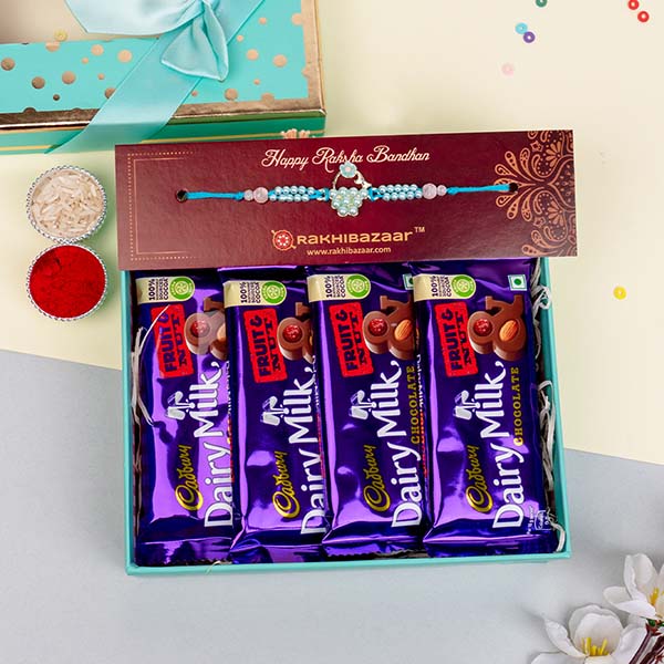 Designer Rakhi with a Combo of Dairy Milk Chocolate