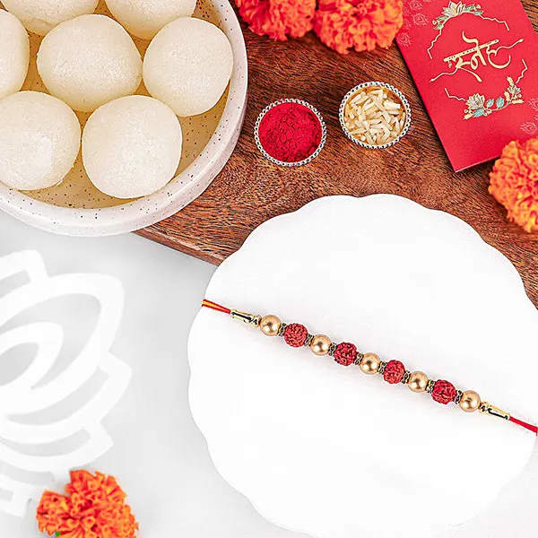 Earthly Blessings Rudraksha Rakhi N Rasgulla Duo