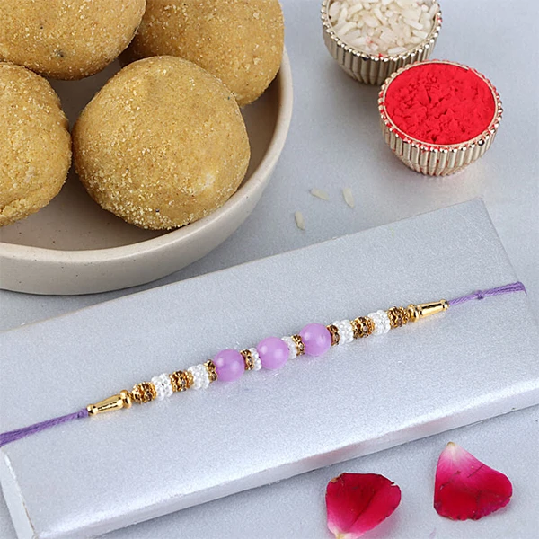 Sneh Nityam Creation Regular Ethnic Pearl Rakhi with Besan Laddoo