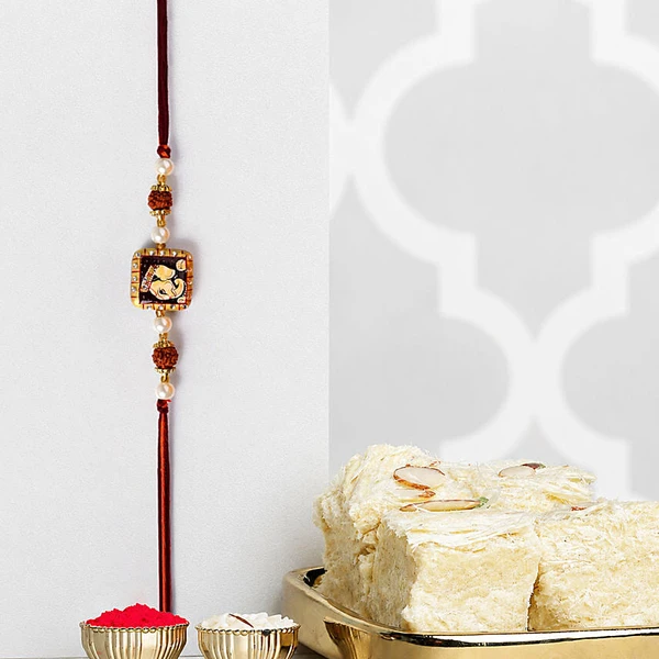 Divine Ganesha Rudraksha Pearl Rakhi with Soan Papdi