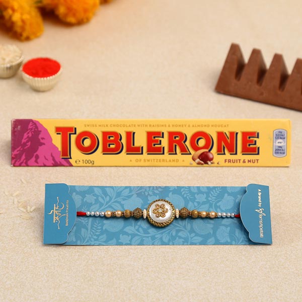 Ethnic Pearl Designer Rakhi And Toblerone Chocolate