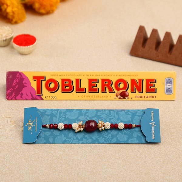 Red Beads Pearl Designer Rakhi And Toblerone Chocolate