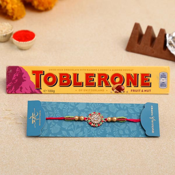 American Diamond Floral Rakhi And Toblerone Chocolate