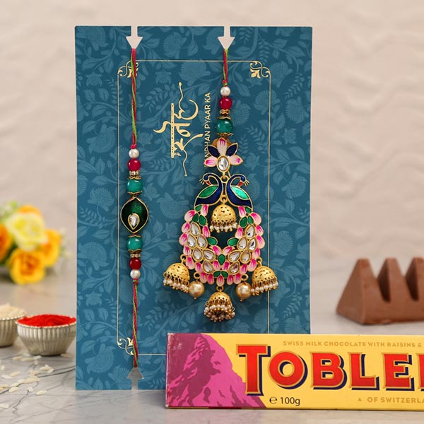 Pink Peacock Lumba Rakhi Set With Toblerone Chocolate
