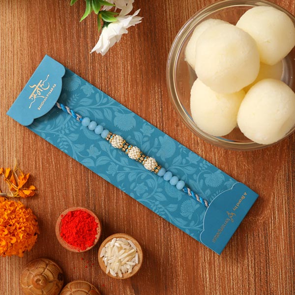 Sea Blue Pearl Designer Rakhi And Rasgulla