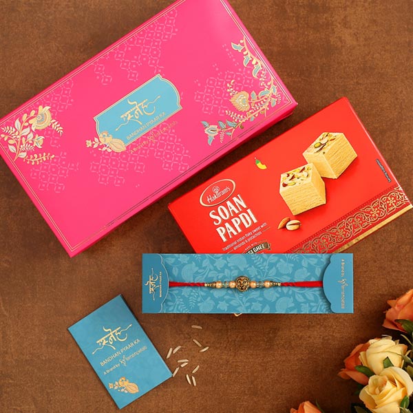 Lion Face Pearl Rakhi And Soan Papdi
