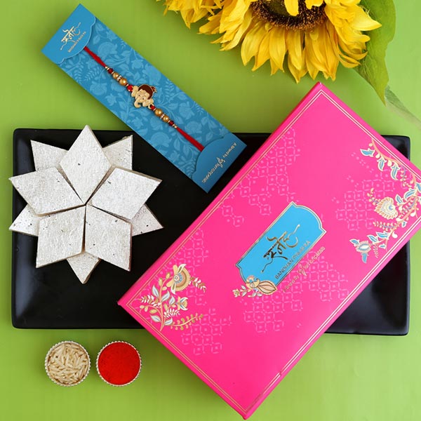 Long Trunk Bal Ganesha Kids Rakhi And Kaju Katli