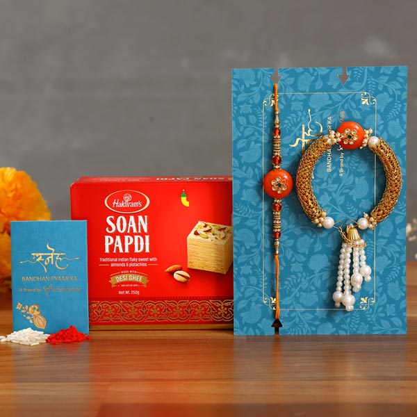 Orange Pearl And Lumba Rakhi Set With Soan Papdi