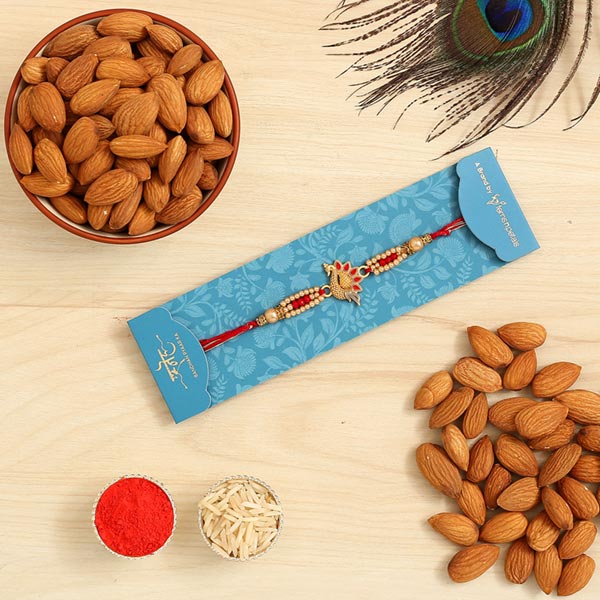 Red Peacock Designer Rakhi And Healthy Almonds