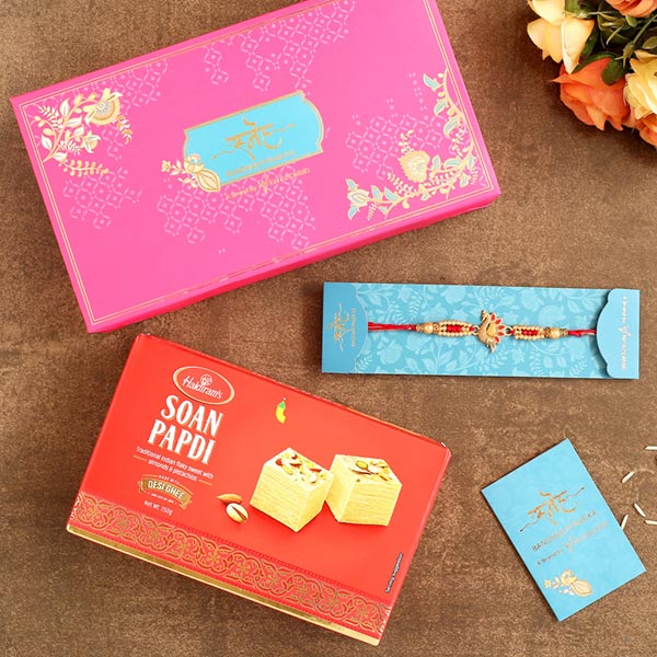 Red Peacock Designer Rakhi And Soan Papdi