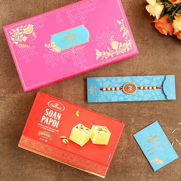 Spiritual Om Pearl Rakhi And Soan Papdi