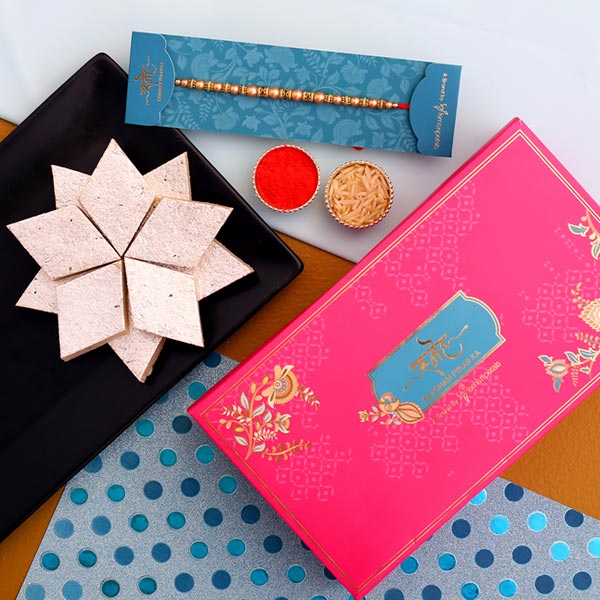 Traditional Pearl Mauli Rakhi And Kaju Katli