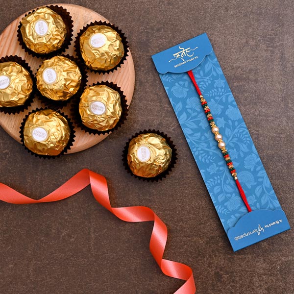 Traditional Pearl Studded Mauli Rakhi And 3 Pcs Ferrero Rocher