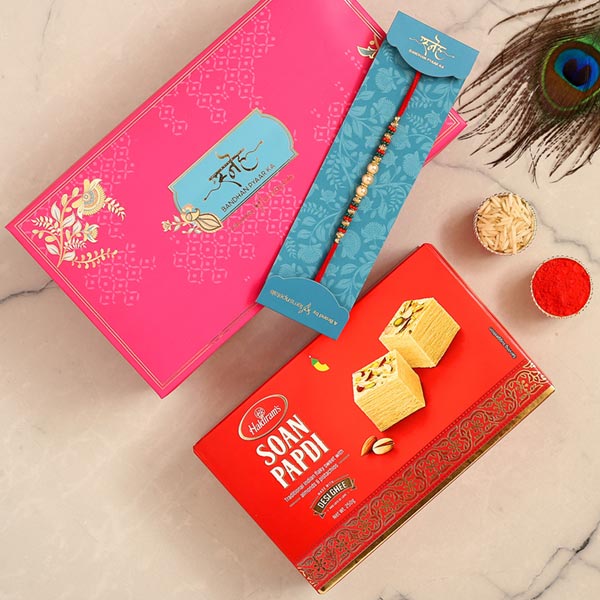 Traditional Pearl Studded Mauli Rakhi And Soan Papdi