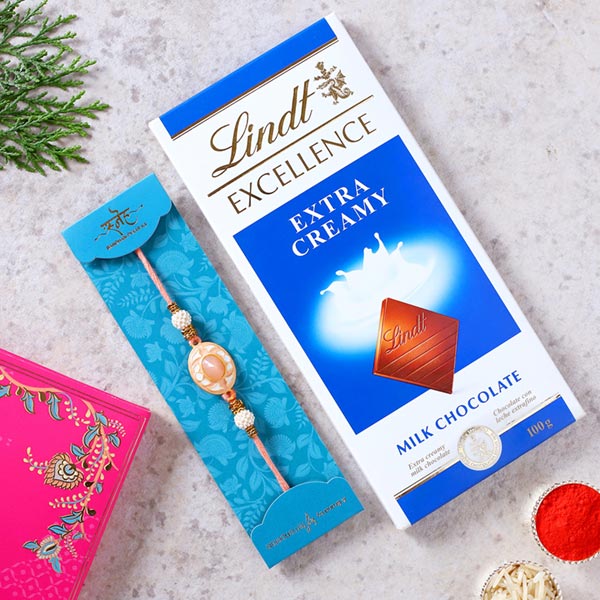 White Peach Stone Designer Rakhi And Lindt