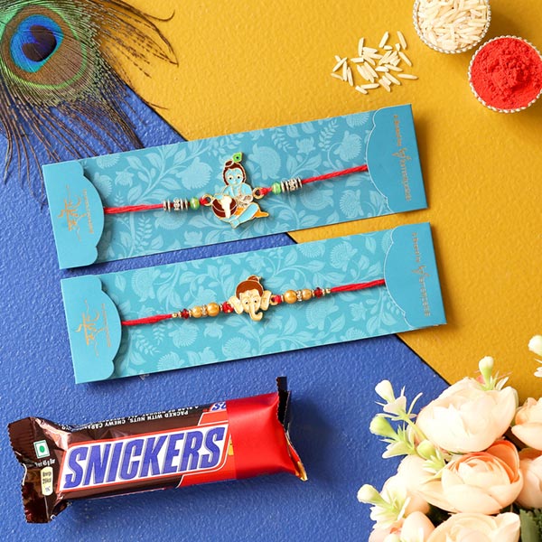 Bal Krishna & Ganesha Face Rakhis With Snickers