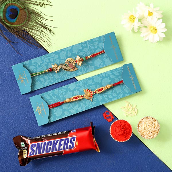 2 Peacock Rakhis & Snickers Chocolate Combo