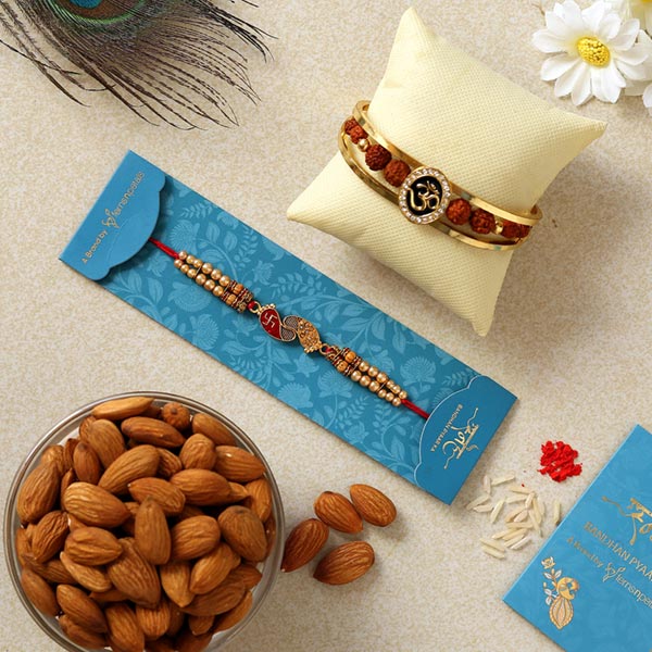Om Bracelet & Red Peacock Rakhis With Almonds
