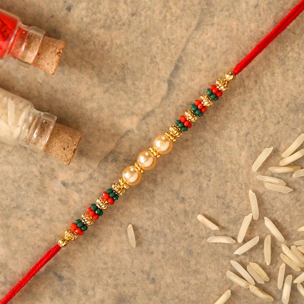 Traditional Pearl Studded Mauli Rakhi