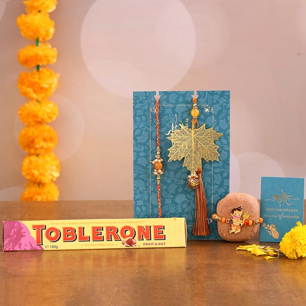 Maple Leaf Lumba Rakhi Set & Kids Rakhi With Toblerone