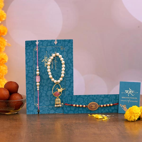 Caged Bird Lumba Rakhi Set & Om Rakhi With Gulab Jamun