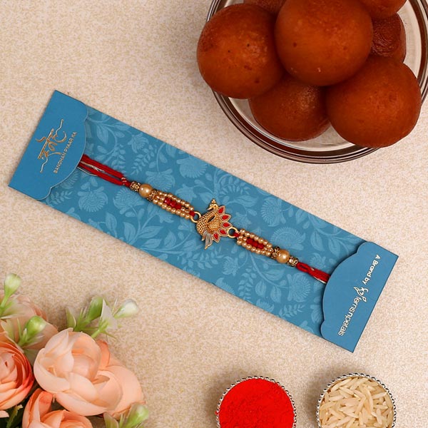 Red Peacock Rakhi & Gulab Jamun Tin