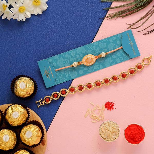 Rudraksha & Peach Rakhis With 3 Pcs Ferrero Rocher