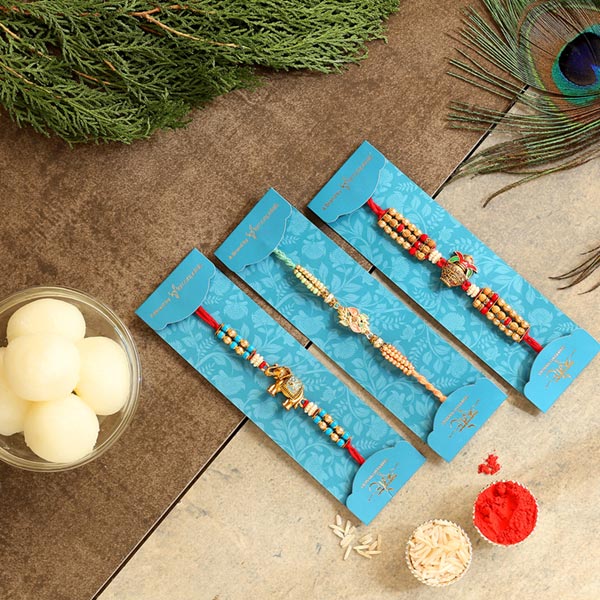 Set Of 3 Designer Rakhis & Yummy Rasgulla Tin