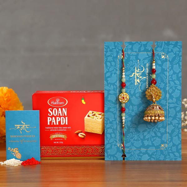 Dancing Peacock Jhumki Lumba Rakhi Set With Soan Papdi