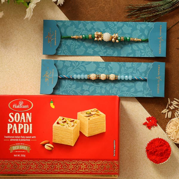 Set Of 2 Pearl Designer Rakhis & Soan Papdi