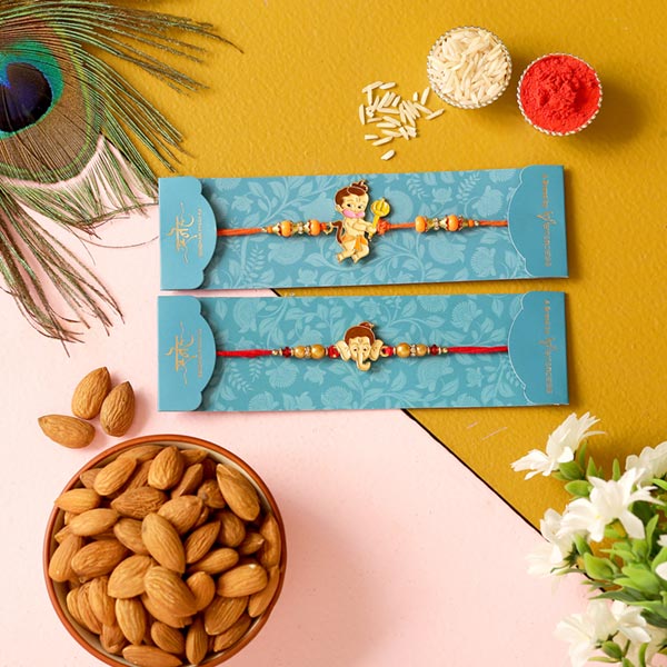 2 Devotional Kids Rakhis & Almonds Combo
