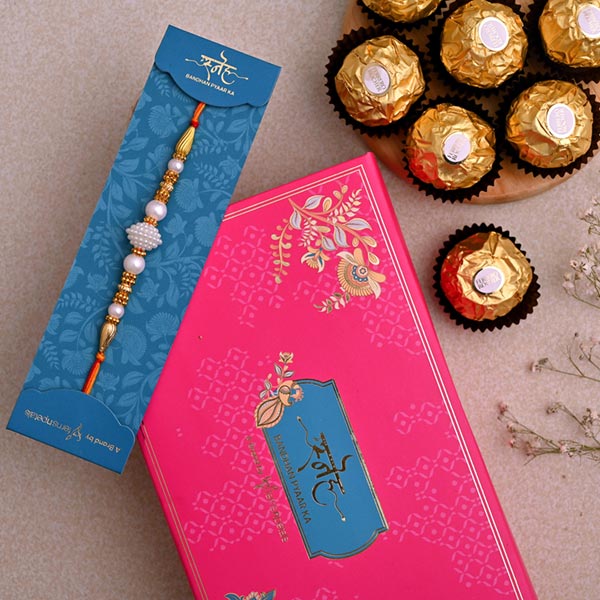Elegant Pearl Mauli Rakhi And 3 Pcs Ferrero Rocher