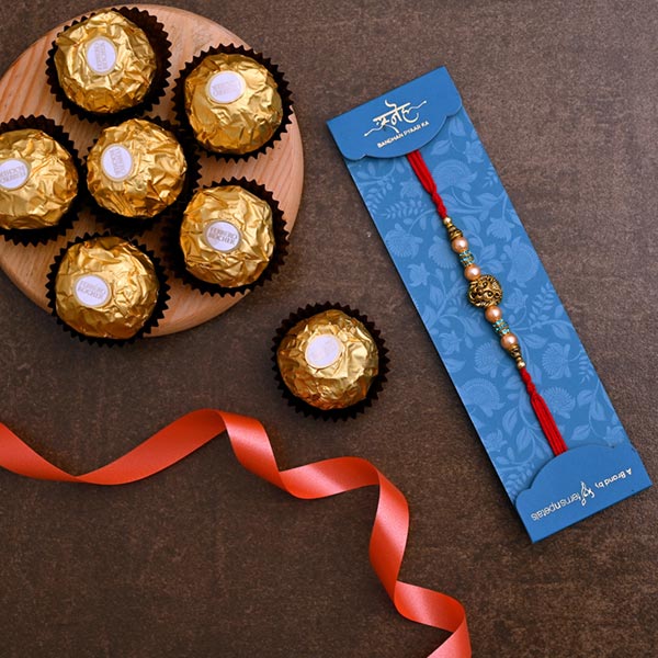 Lion Face Pearl Rakhi And 3 Pcs Ferrero Rocher