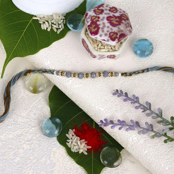 Sizzling Golden Ball Beads Rakhi For UK