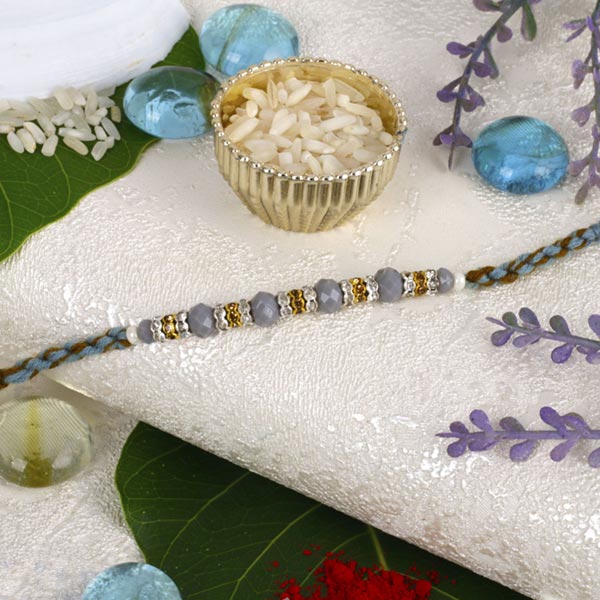 Sizzling Golden Ball Beads Rakhi For UK
