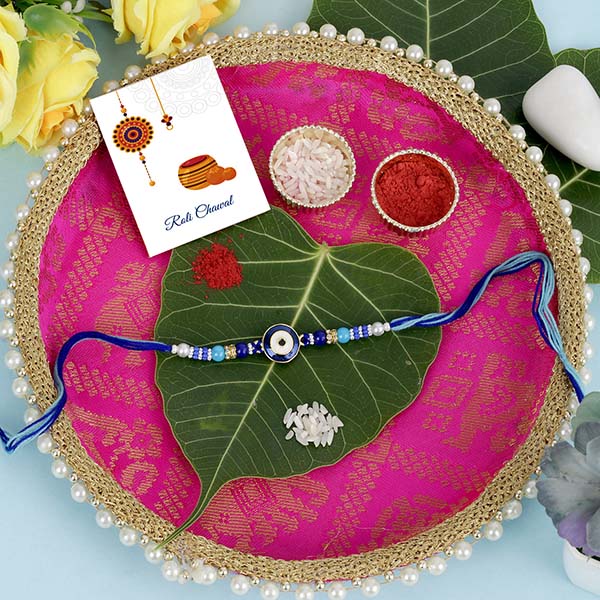 Astounding Blue Designer Rakhi with Puja Thali