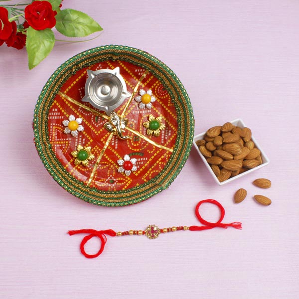 Pleasing Pink Diamond Puja Thali Almond Rakhi Hamper For UK